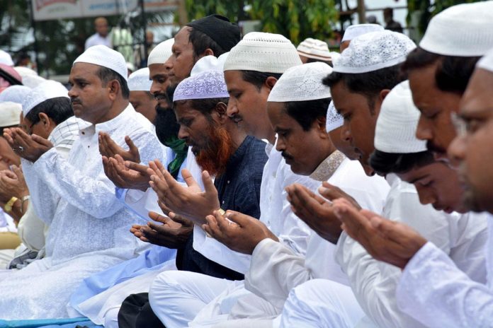 Muslims offer namaz on the occasion of Eid ul-Fitr celebrations at Iddgah field in Guwahati on Tuesday 29th July 2014. (Photo: IANS)